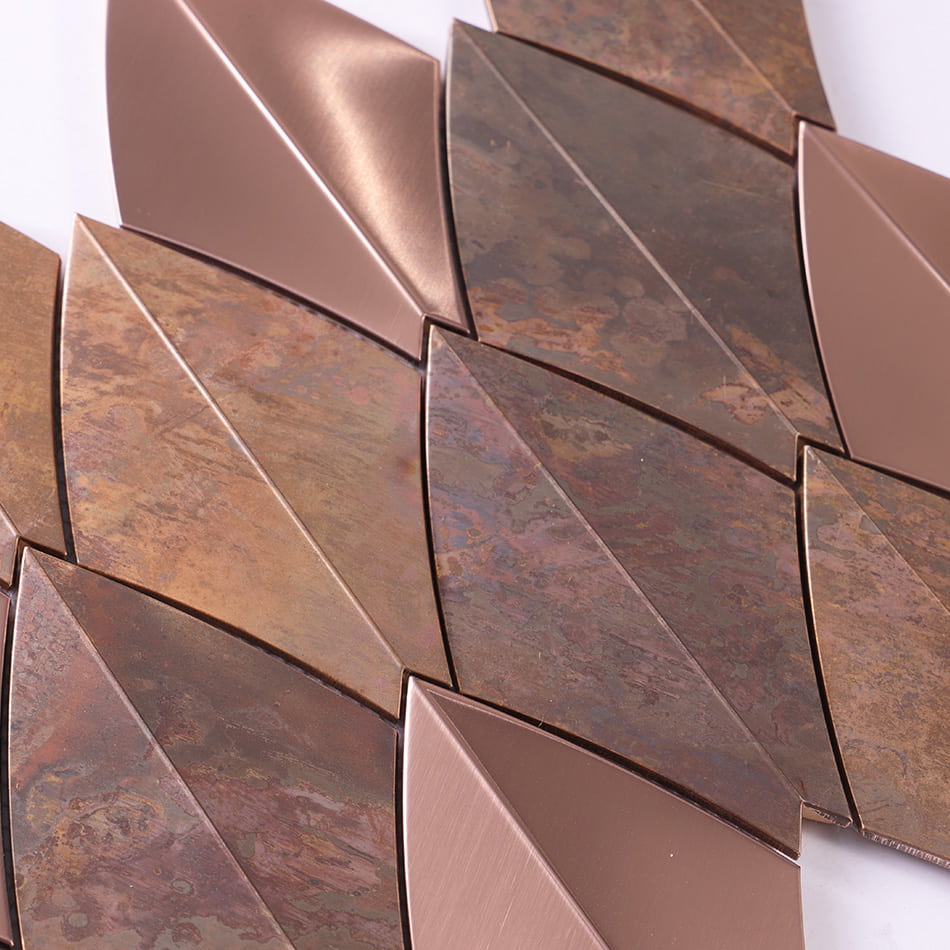 Close up of rose gold and rustic copper curved diamond metal mosaic tile