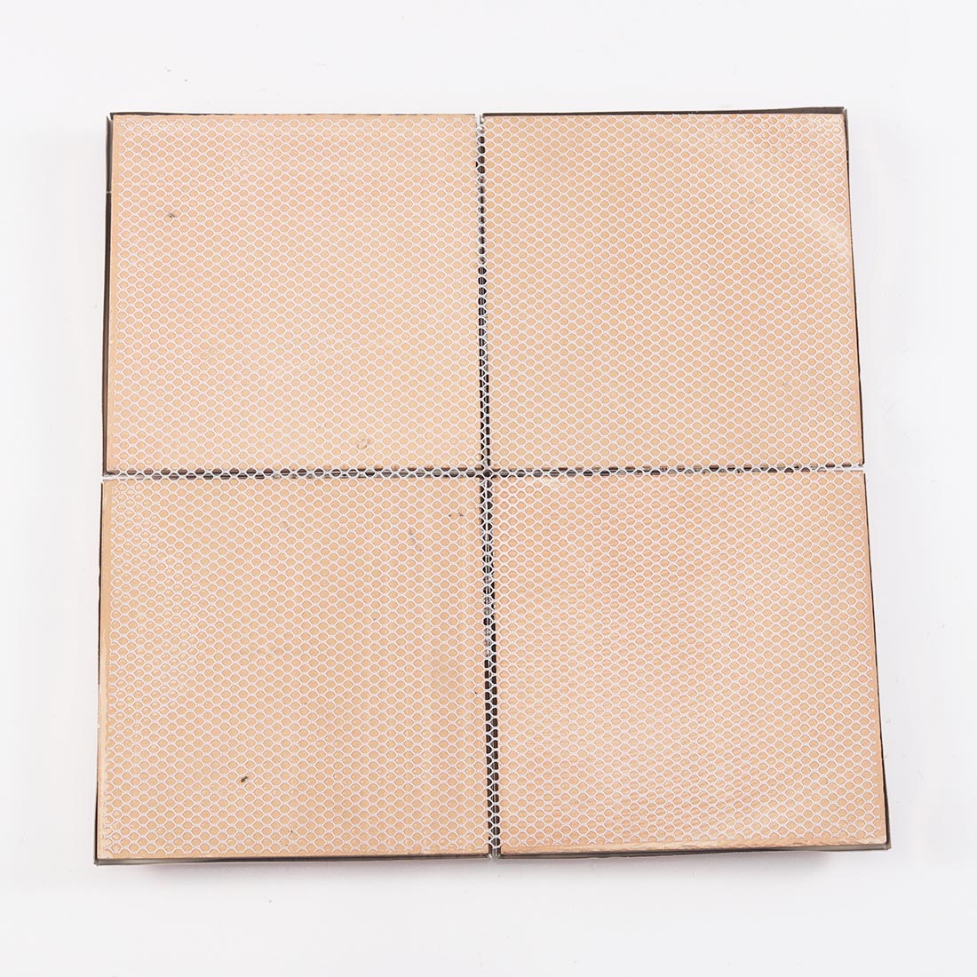 Rose gold square metal tile sheet showing mesh mounted back