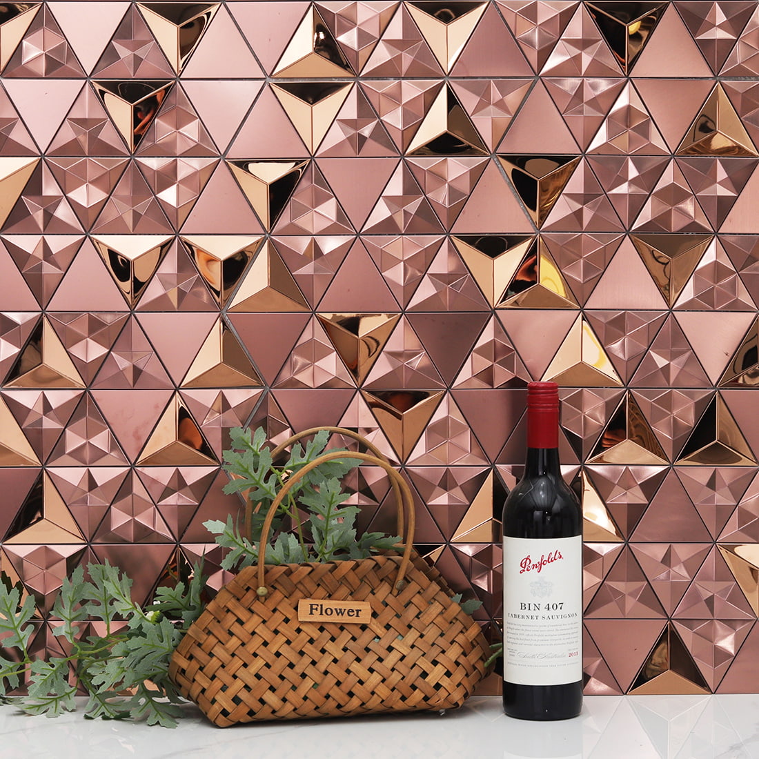 Rose gold triangle metal mosaic kitchen backsplash with gold accents