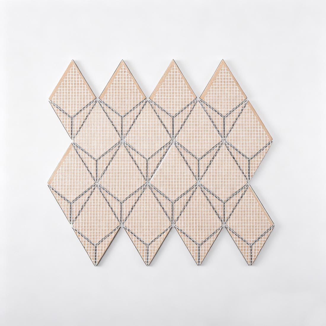 Mesh mounted backing of seafoam green kite metal mosaic for easy installation