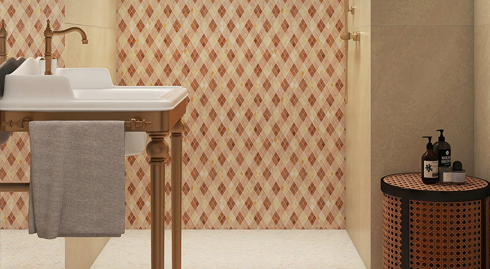 {"default":"Luxury bathroom vanity featuring orange diamond-patterned mosaic shower tiles and brass fixtures."}
