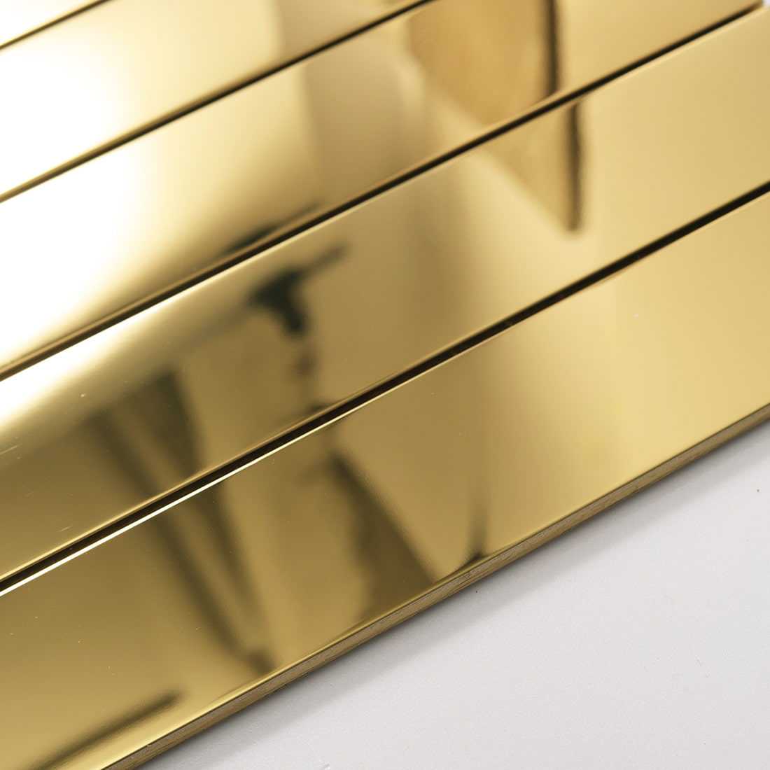 Side view showing the thickness of gold glossy linear tile.