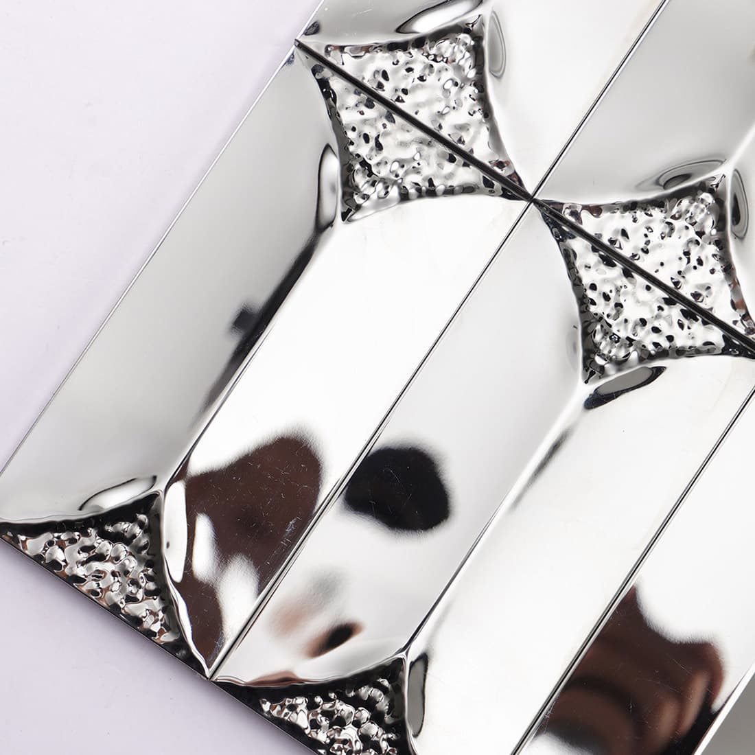 Side view showing the 3D depth and thickness of silver beveled metal tile.