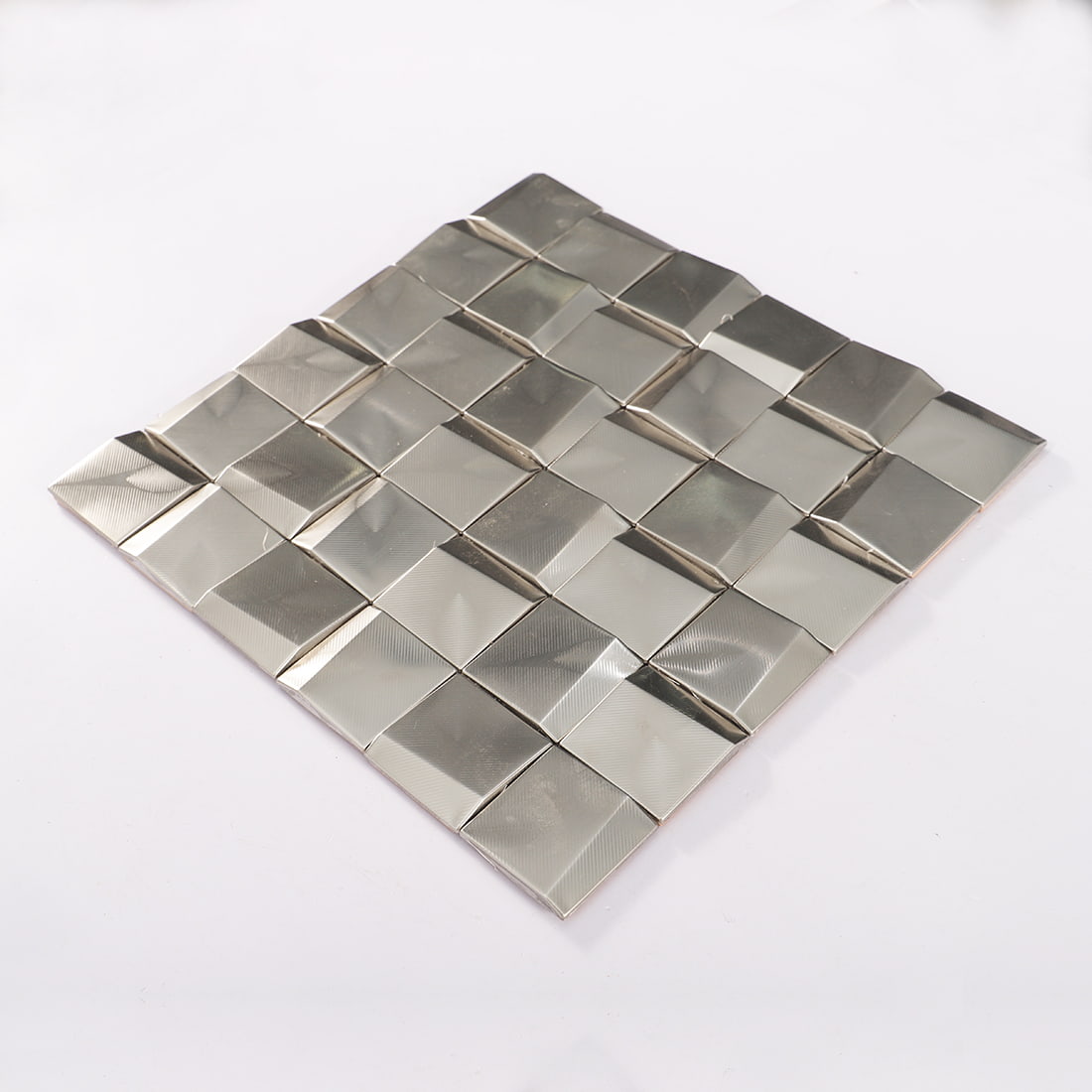 Perspective view of silver brushed square metal mosaic tile sheet