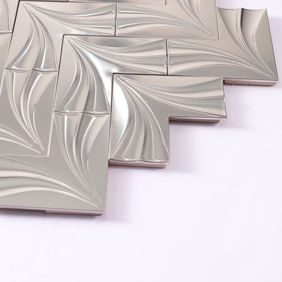 Edge detail of silver chevron stainless steel mosaic tile sheet