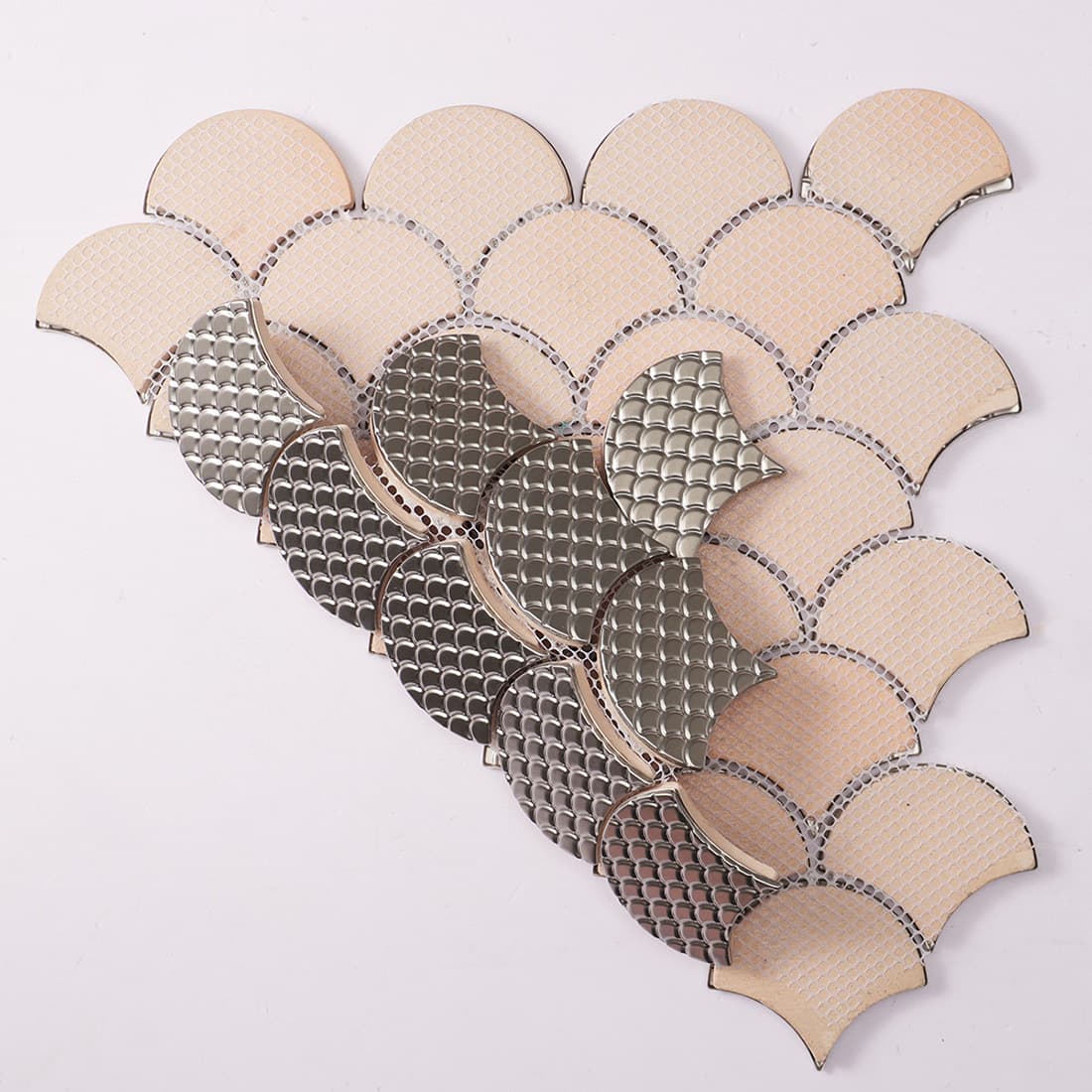 Back view of silver fish scale metal mosaic tile with mesh backing