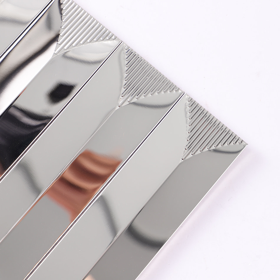 Corner close up of silver pointed arch long strip tile