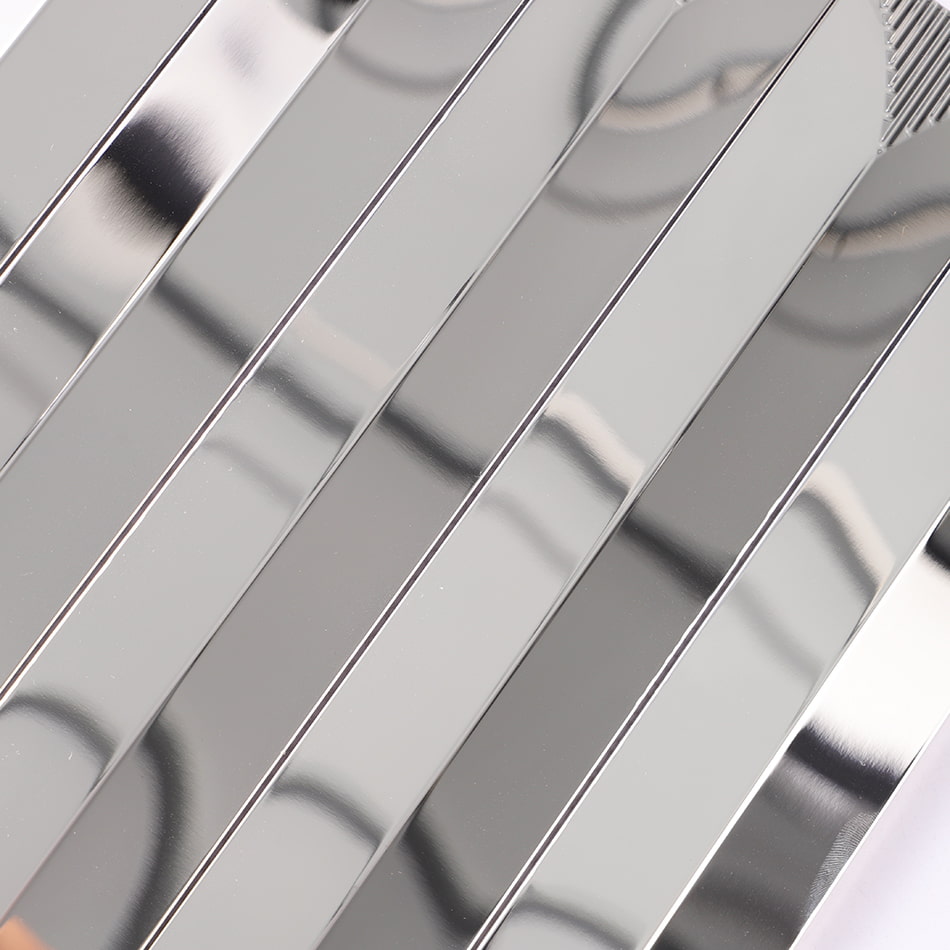 Surface detail of silver reflective pointed strip tile