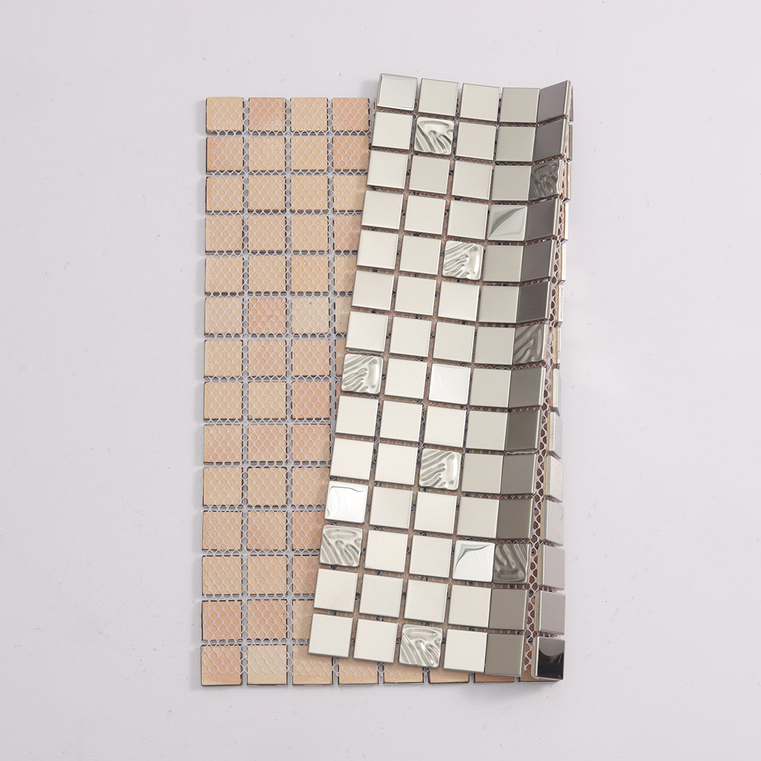 Silver stainless steel mosaic tile showing front square chips and mesh backing