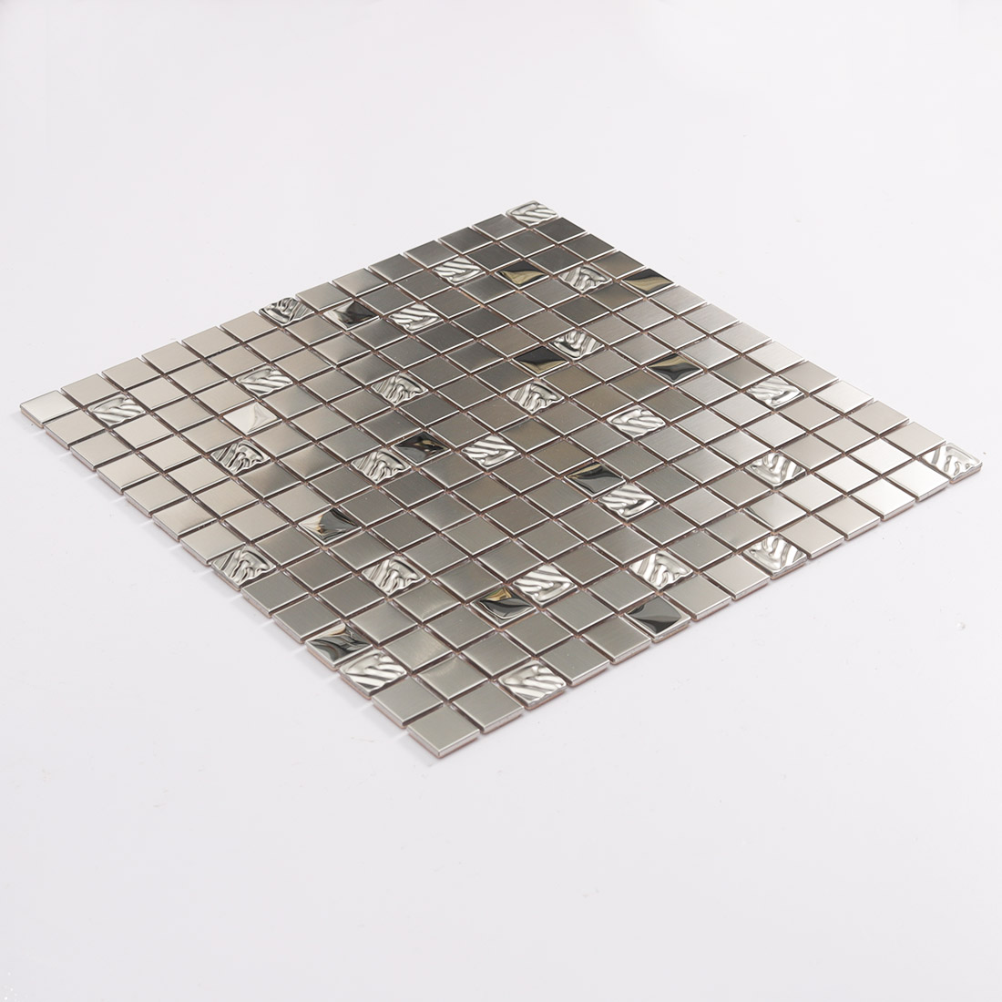 Perspective view of silver stainless steel mosaic tile sheet with mixed glossy accents