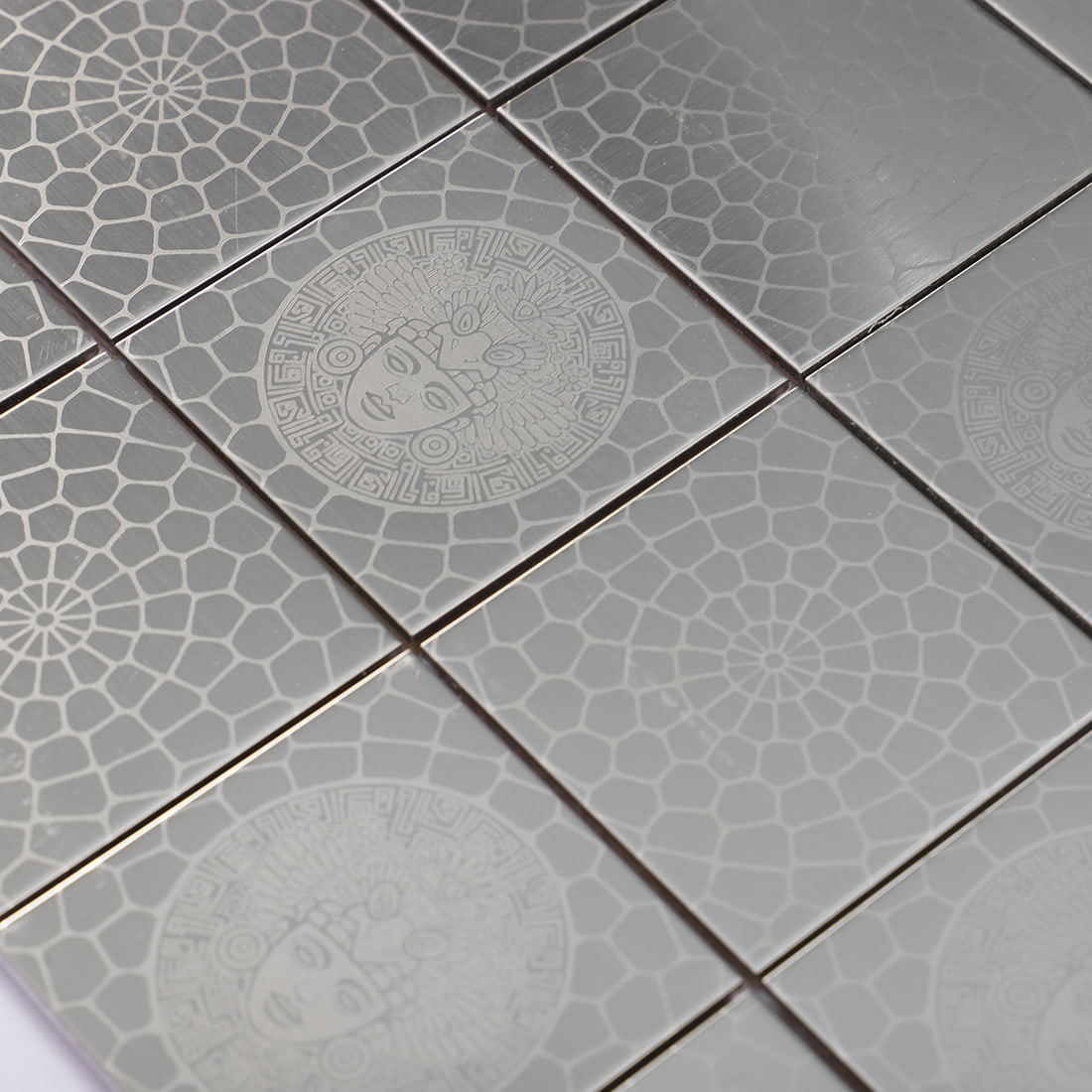 Detail of silver stainless steel square mosaic tile surface