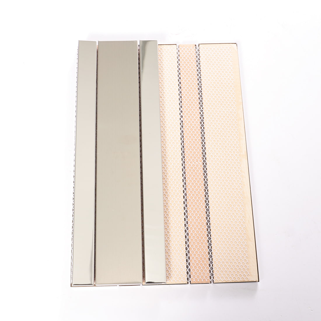 Back view of silver stainless steel strip mosaic with mesh backing