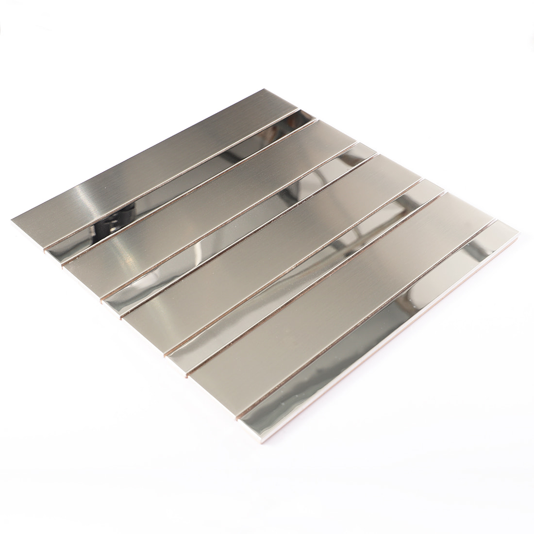 Angled view of silver strip metal mosaic tile sheet