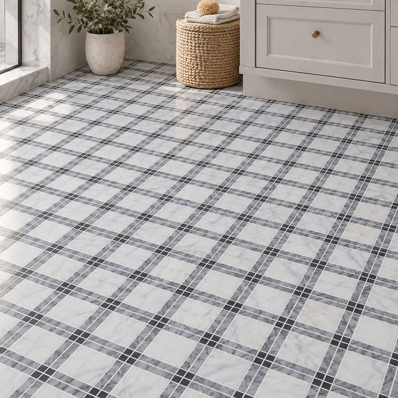 Close-up of a gray and white marble plaid mosaic bathroom floor