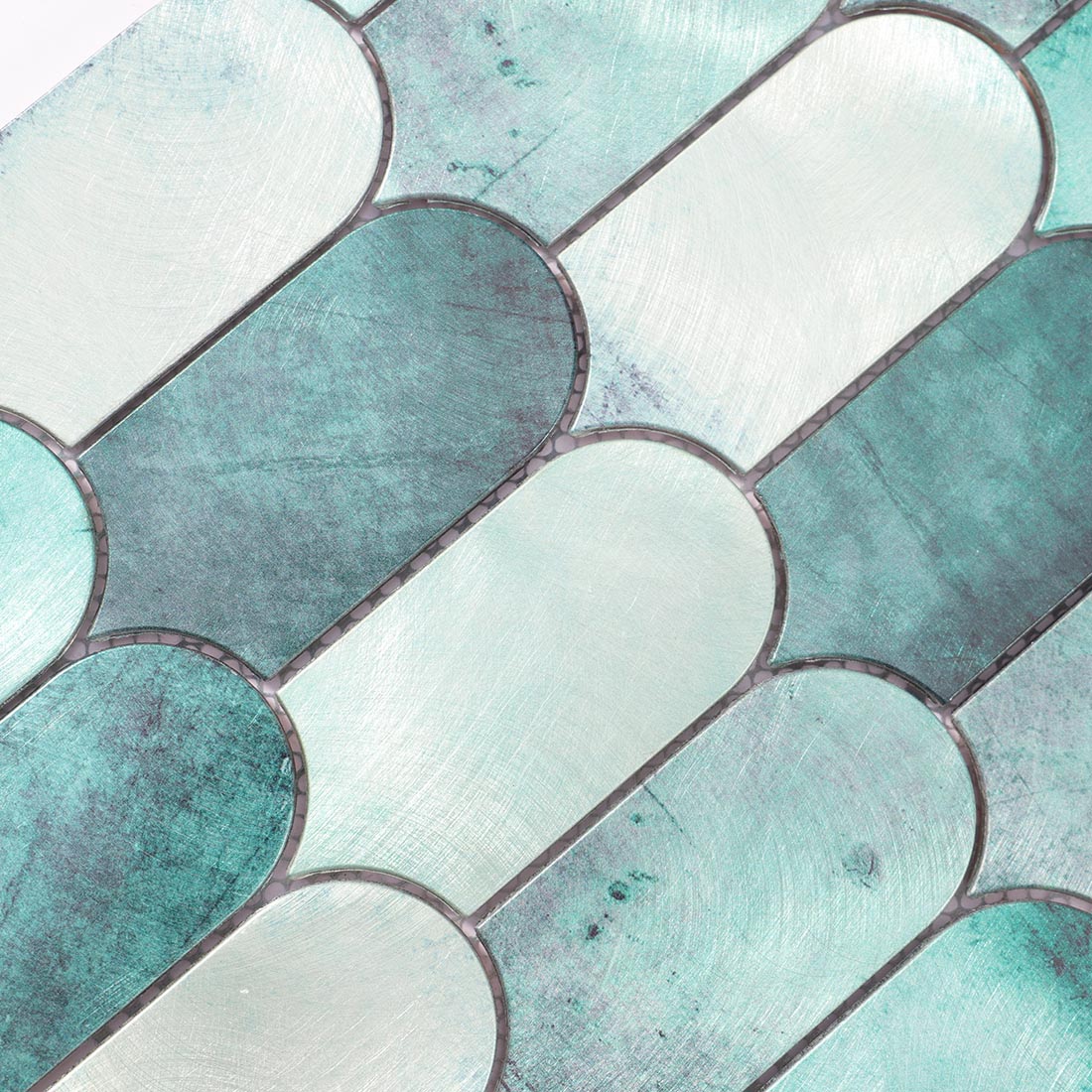 High angle view of teal green arched aluminum tile surface texture
