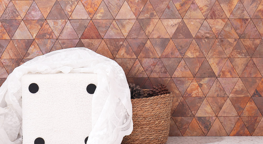 {"default":"Copper rust-look triangle tiles geometric wall pattern"}
