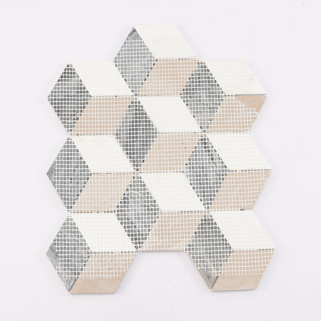 Mesh backing on the reverse side of 3D cube mosaic.