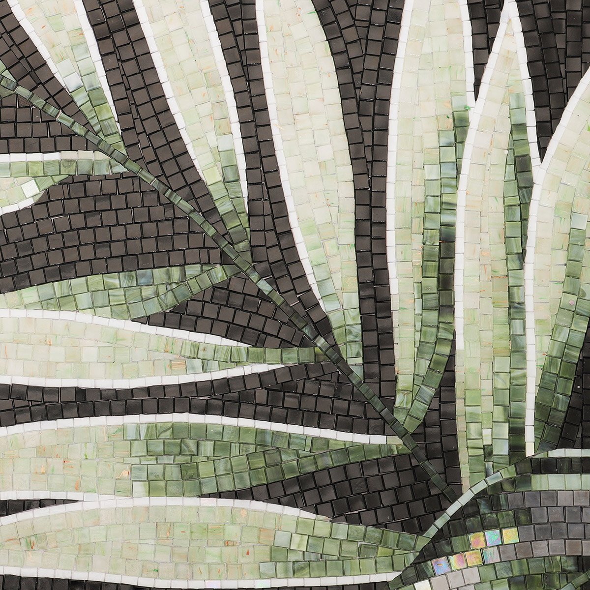 Detailed view of tropical green leaf mosaic pattern with glossy tiles on dark background.