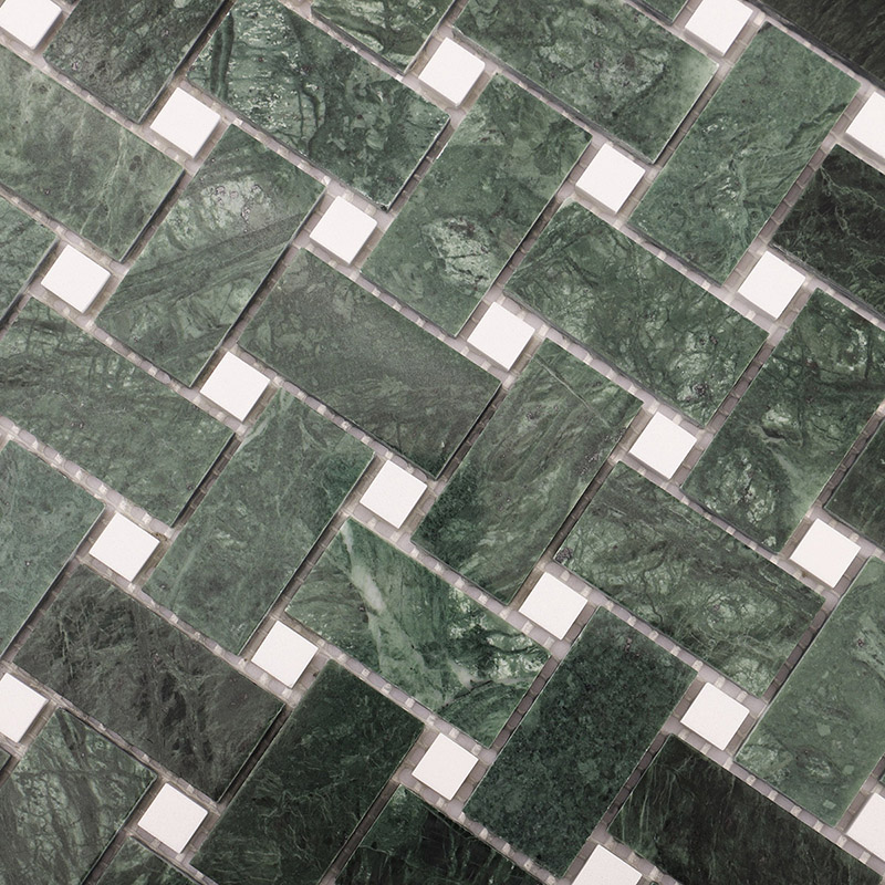 Close-up of green and white marble basketweave mosaic tile with natural veining.