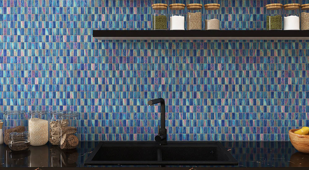 {"default":"Blue glass kit kat vertical kitchen tiles behind a modern black sink."}
