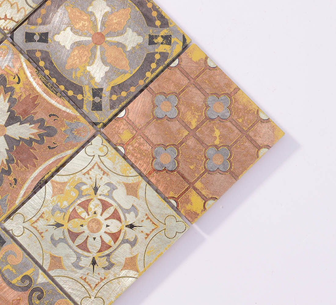 Close-up detail of vintage copper patterned square aluminum mosaic tile corner