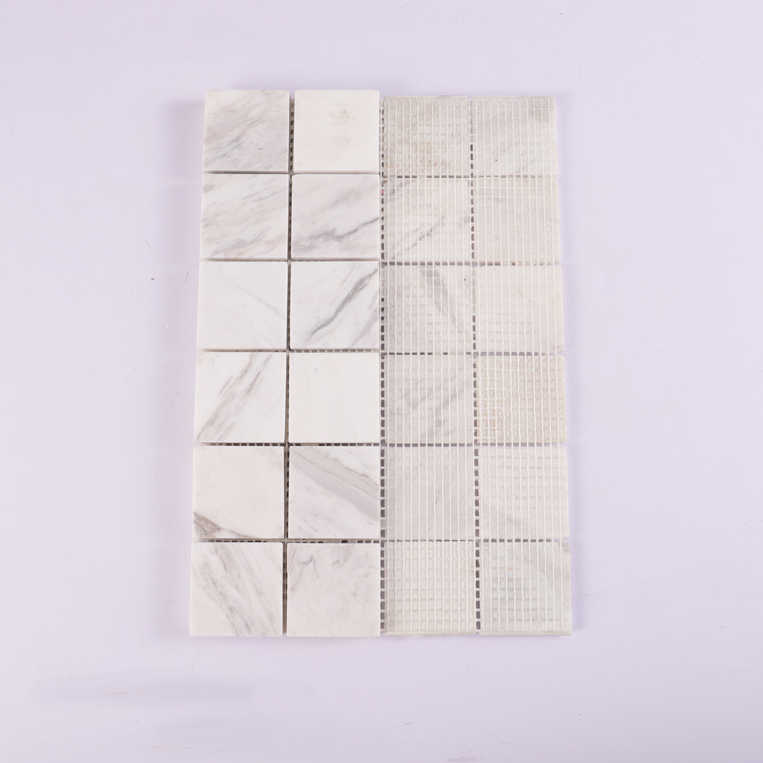 Back view of Volakas white square marble mosaic tile with mesh backing