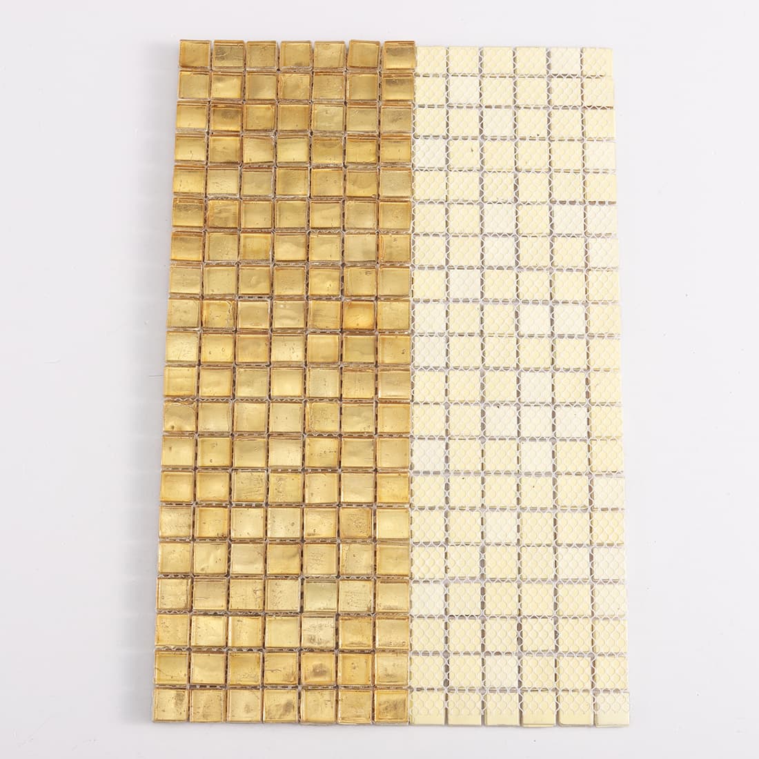 Back view of warm gold square glass mosaic tile with mesh backing