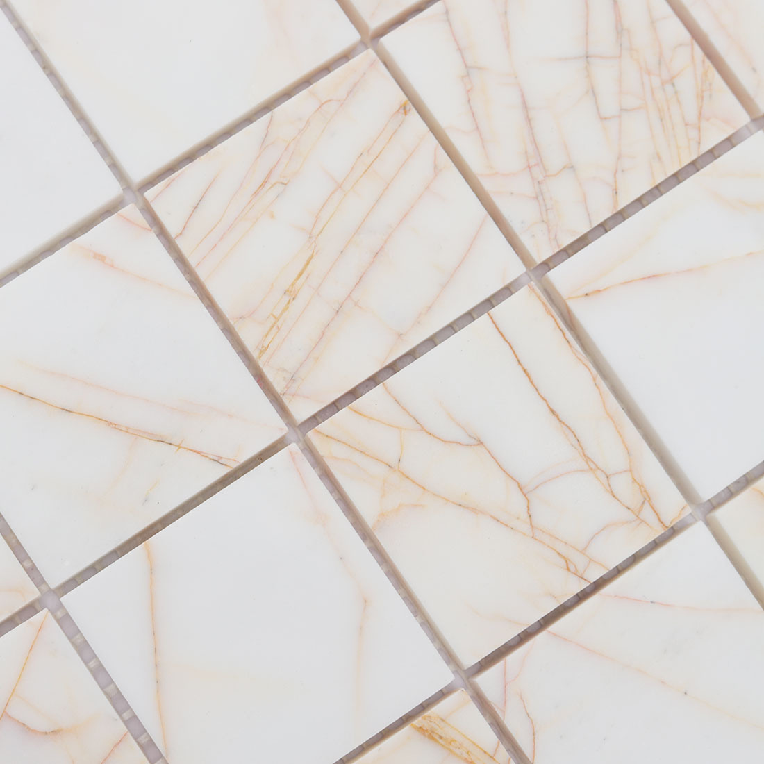Warm white square marble mosaic texture with delicate golden veins