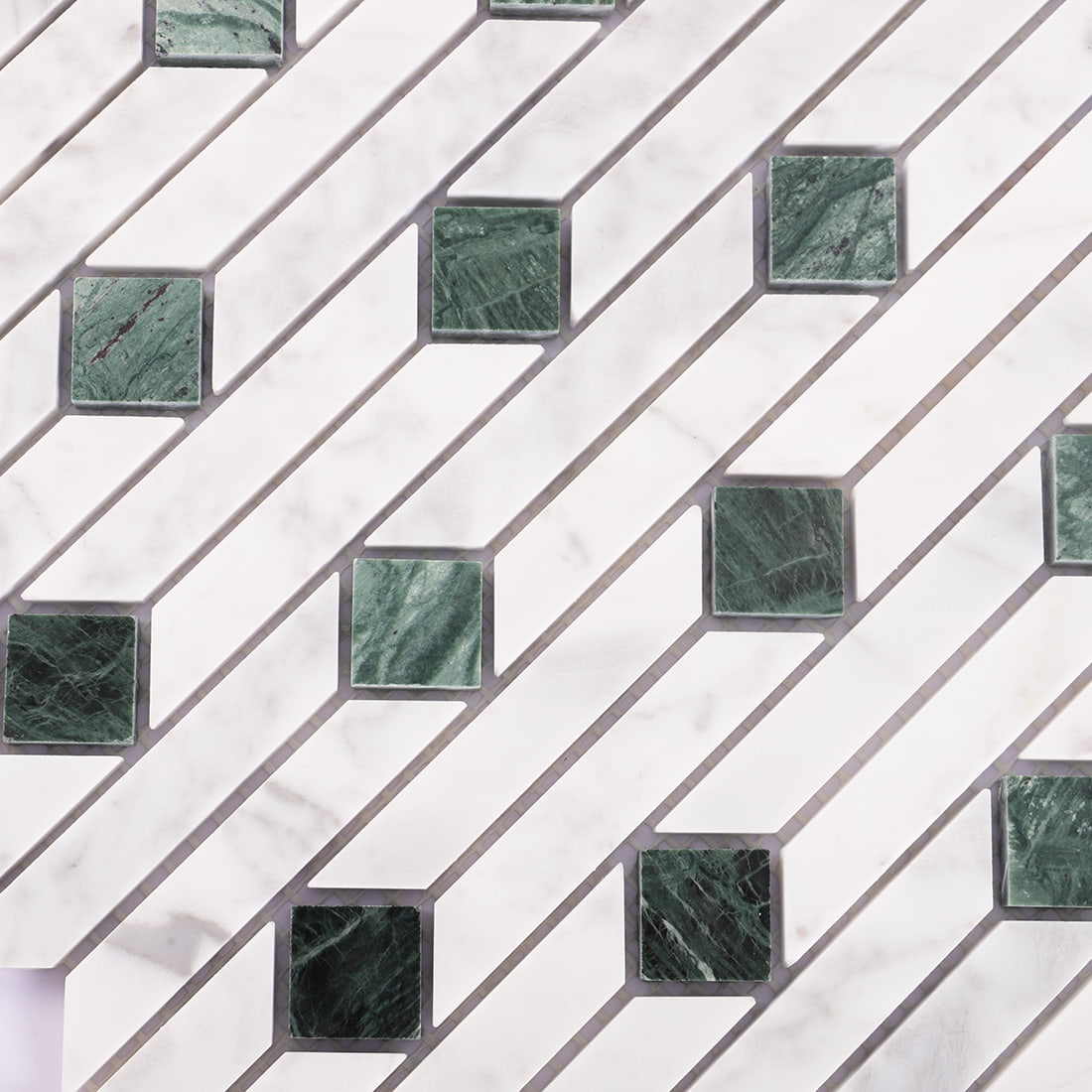 Close-up of white and green marble linear mosaic tile pattern
