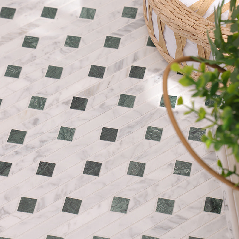 White and green marble linear mosaic tile floor scene with basket and plant