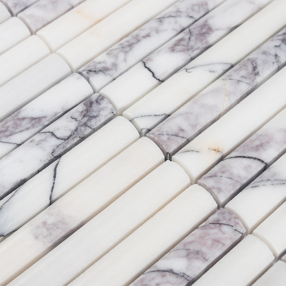 Close-up of white and lilac marble finger mosaic tile surface