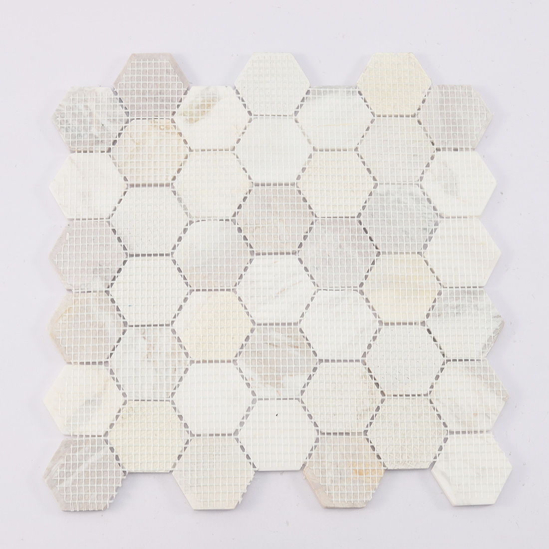 Mesh mounted back of white beige hexagon marble mosaic tile sheet