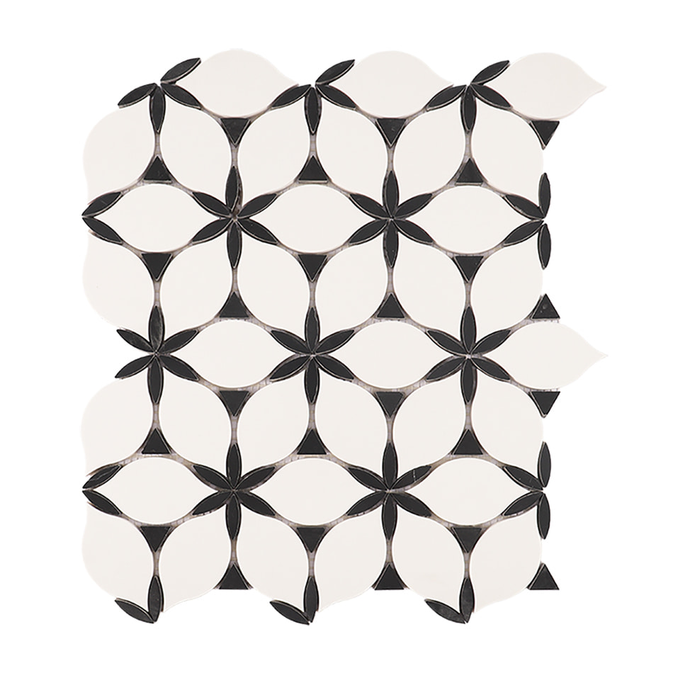 Full sheet of white and black petal marble mosaic tile in a floral repeat design