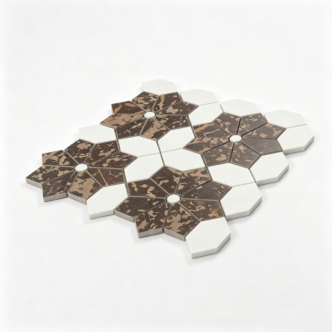 Angled view of white and brown floral marble mosaic tile sheet on a white background