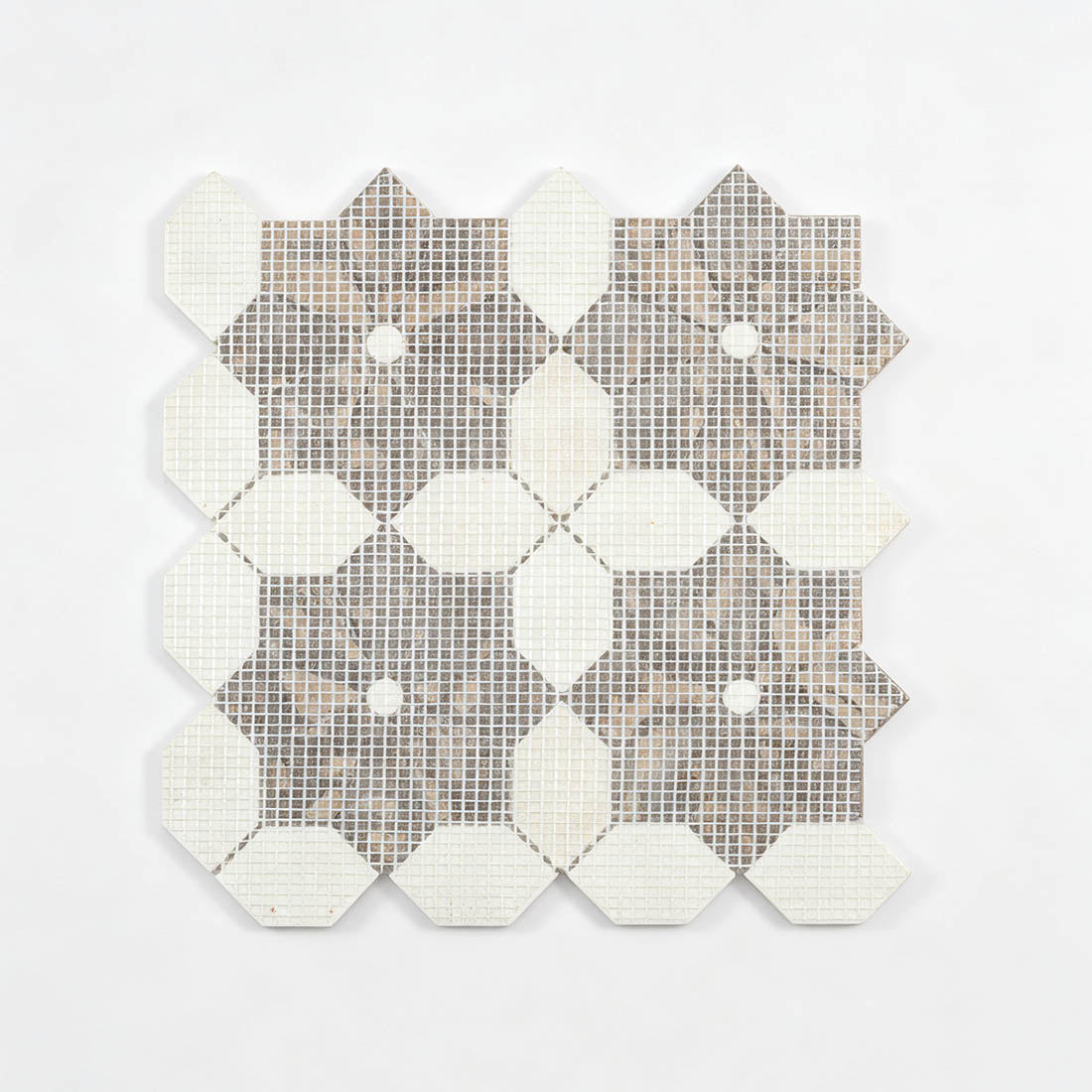 Back view of white and brown floral marble mosaic tile sheet with mesh backing