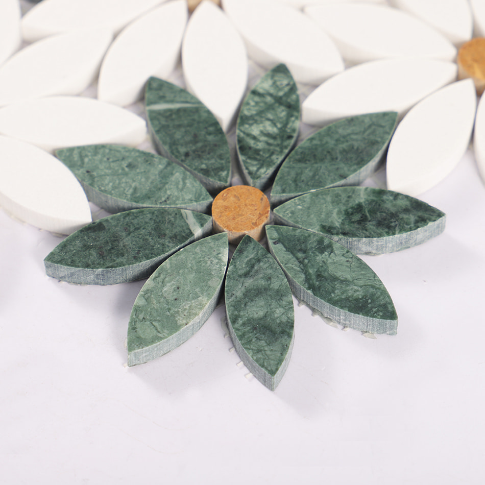 Side detail of green marble daisy mosaic with raised petal pieces