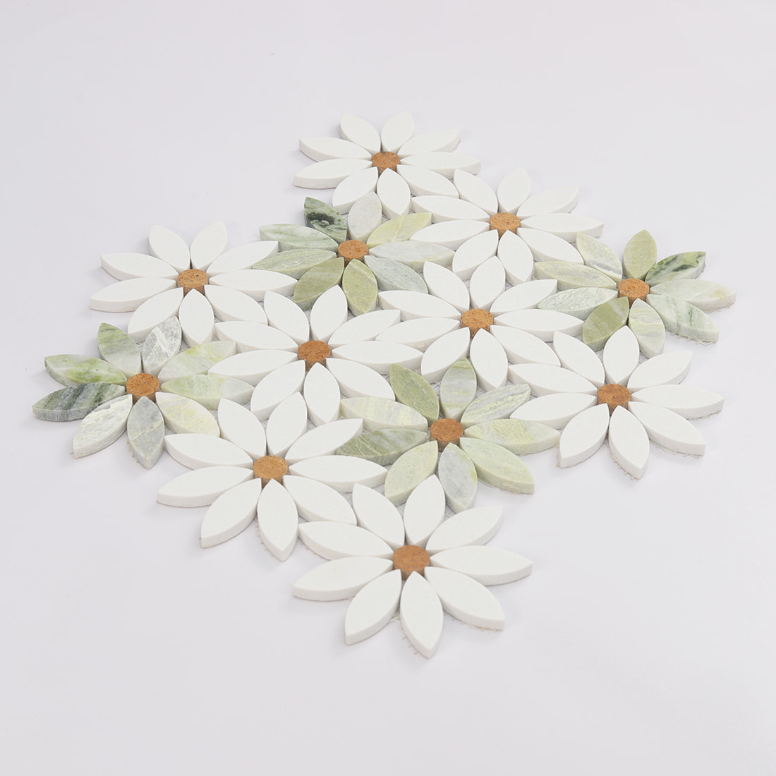 Angled view of white and green flower marble mosaic tile sheet