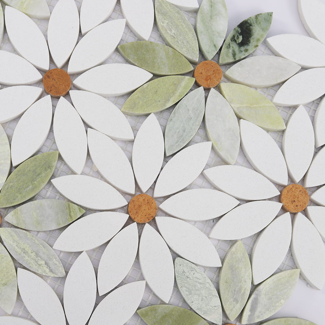 Close up of flower marble mosaic with white petals and soft green accents