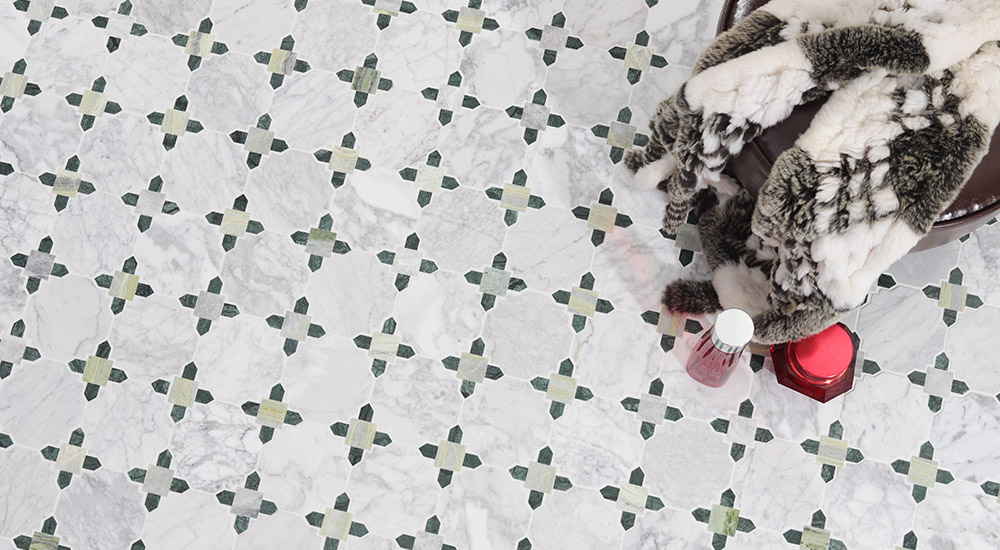 {"default":"White and green geometric marble mosaic floor tile room scene with chair and decor"}
