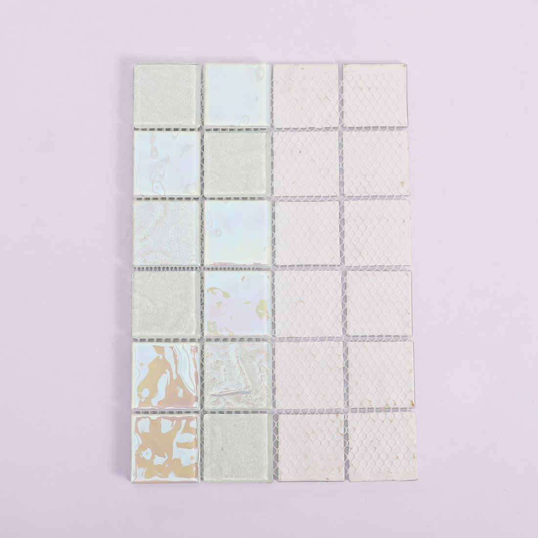 Back view of white iridescent square glass mosaic tile with mesh backing