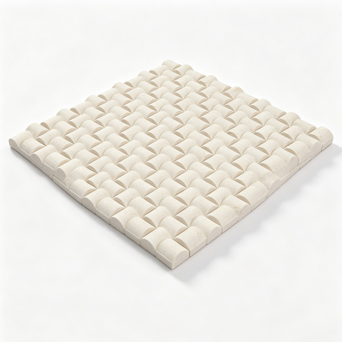 Angled view of white marble bread square mosaic tile sheet