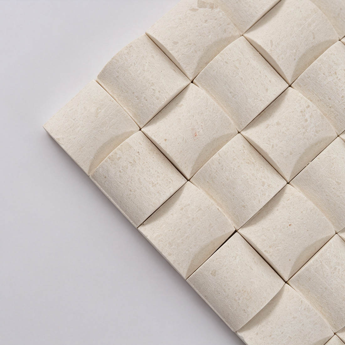 Close-up of white marble bread square mosaic tiles