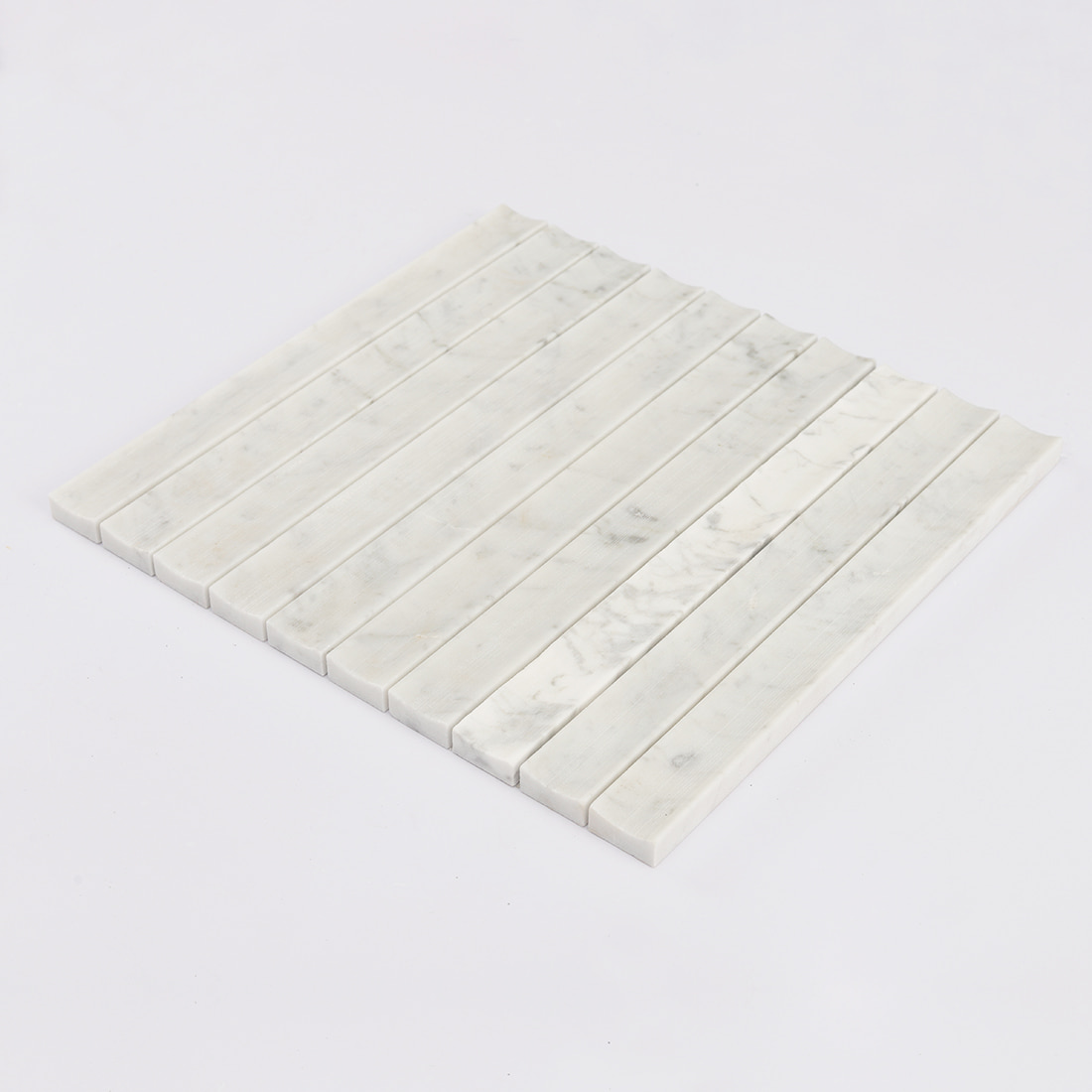 Perspective view of white marble concave vertical mosaic tile sheet