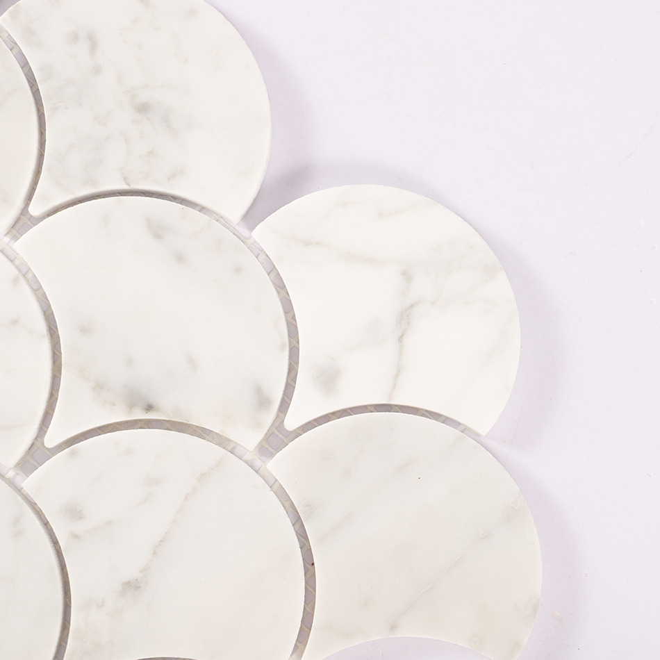 Corner detail of white marble fan mosaic tile