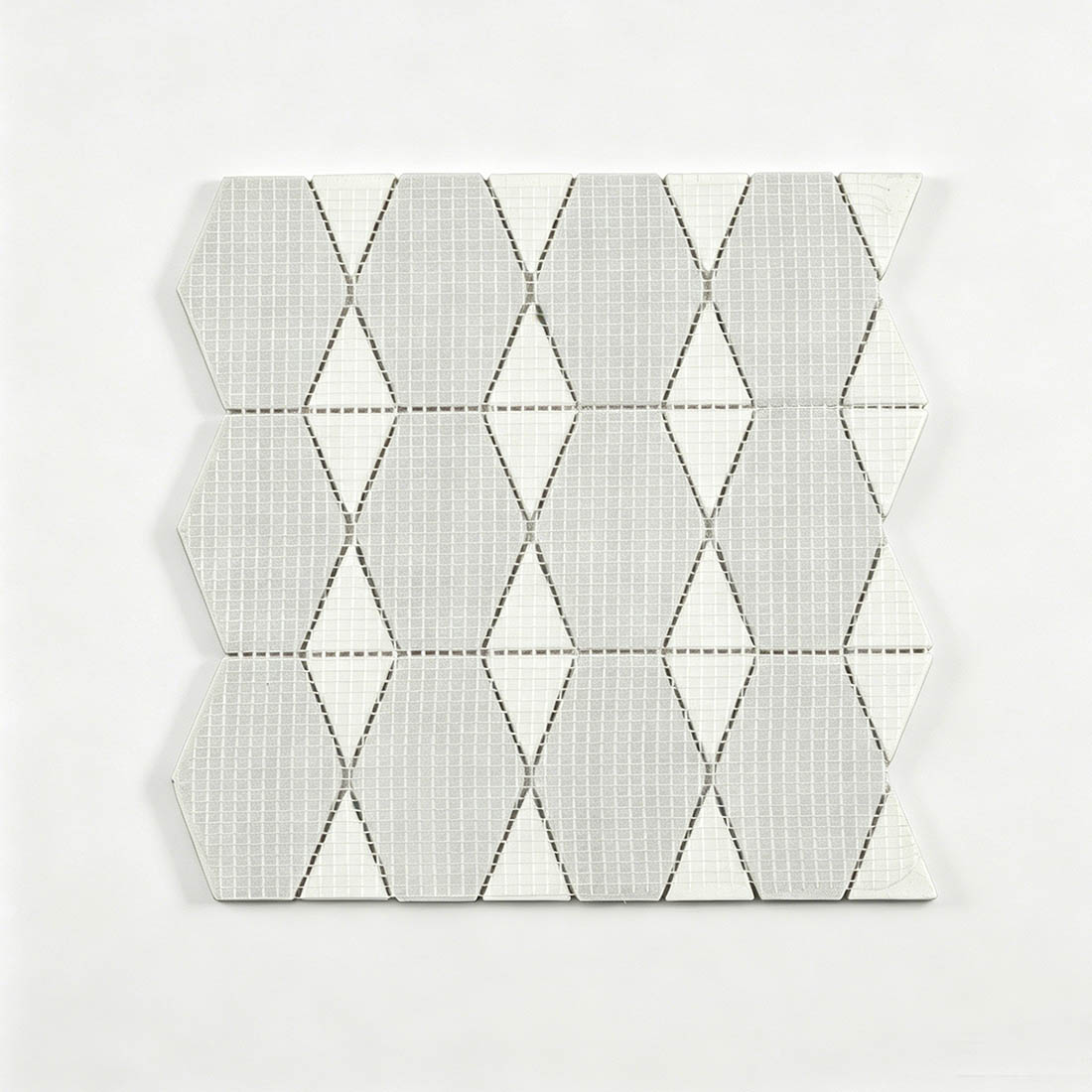 Mesh backing of white marble geometric mosaic tile sheet