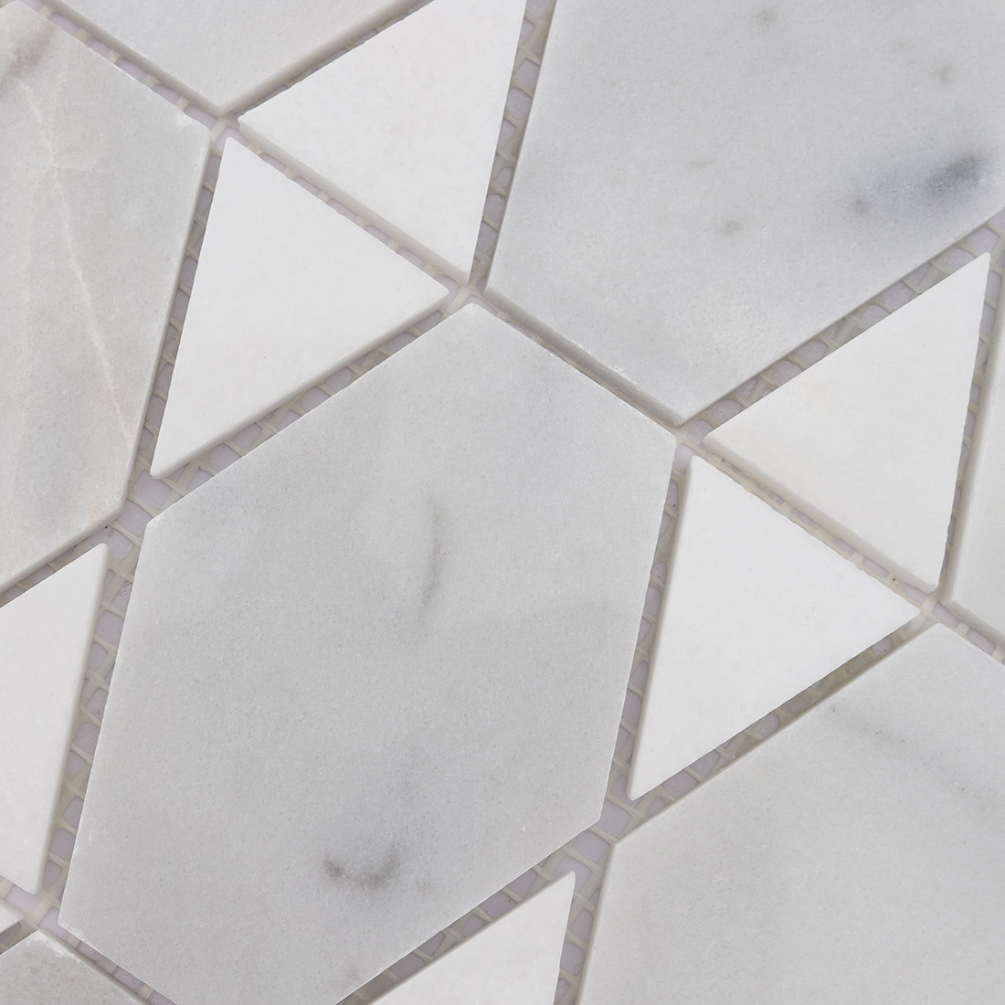 White marble elongated hexagon and triangle mosaic tile pattern