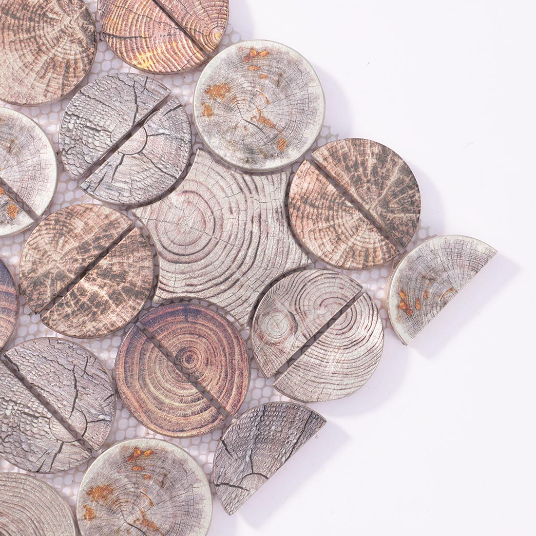 Close-up detail of wood look round aluminum tile with star accent