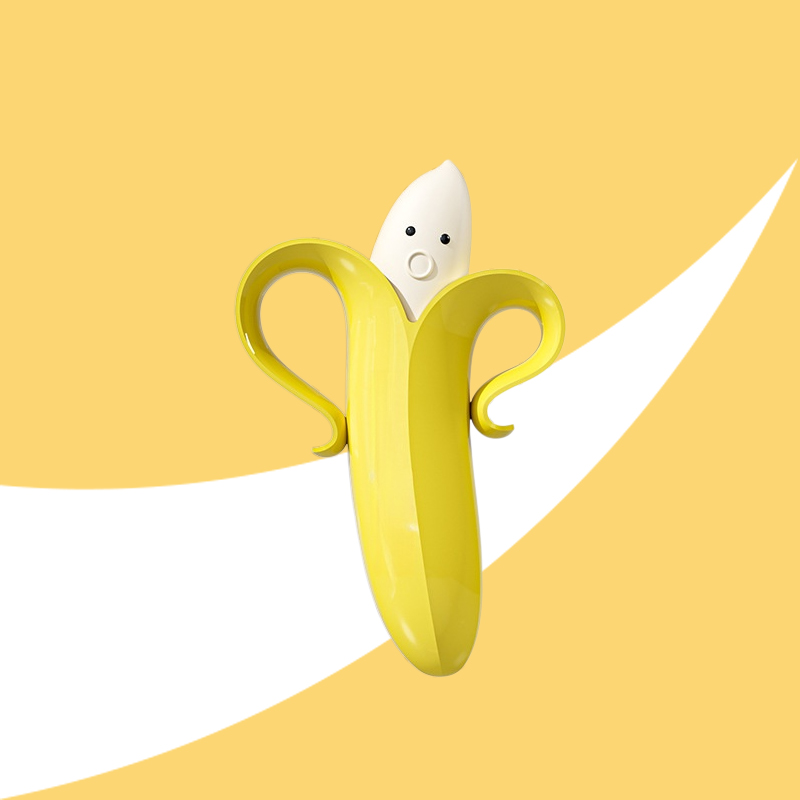 Magnetically Attached Banana-Shaped Hair Cleaning Clip for Bathroom