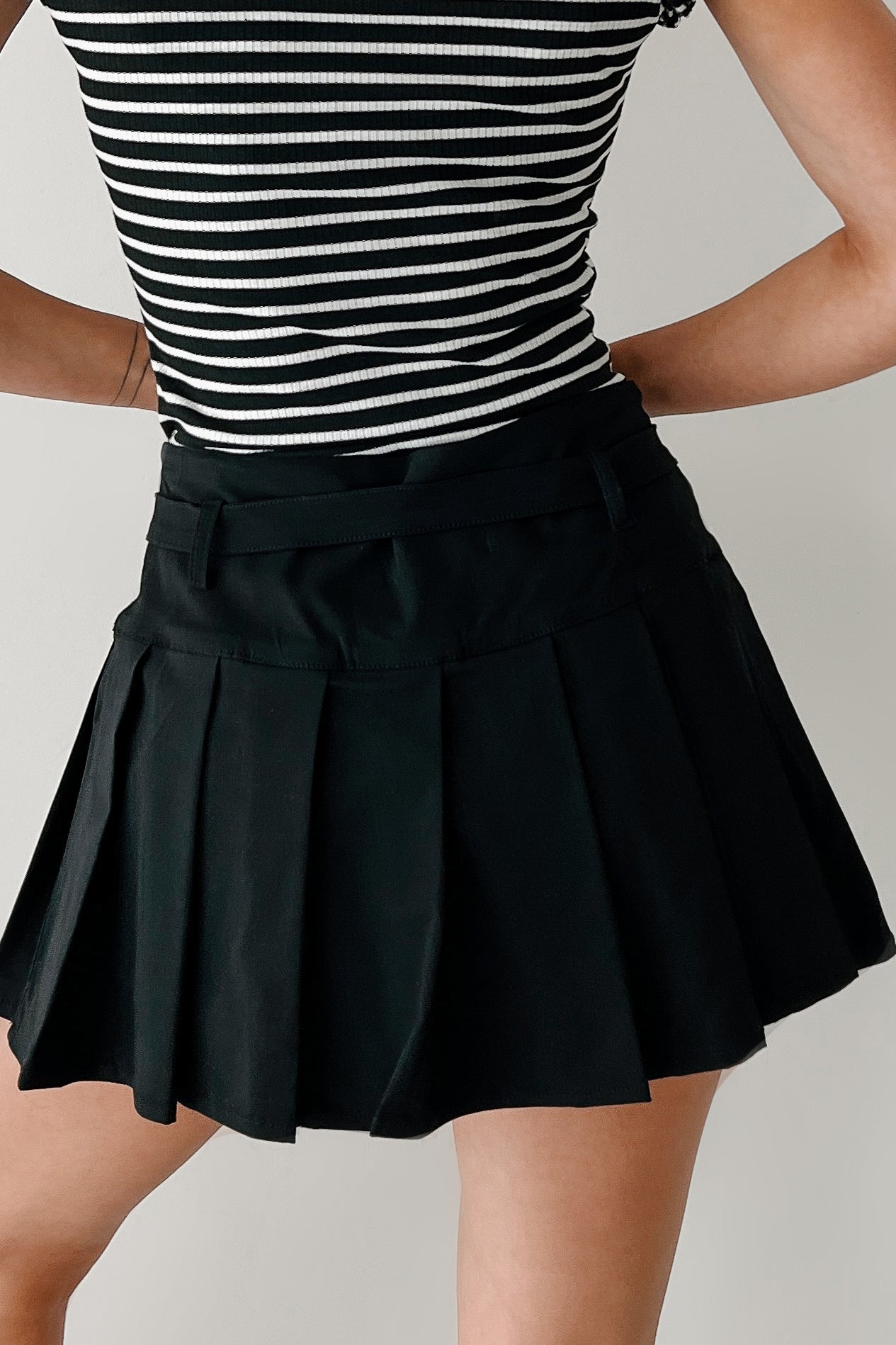 Influence & Inspire Pleated Belted Mini Skirt (Black)-The Formal Wear