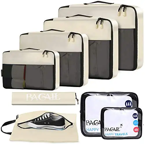 8 packing cubes set in beige with clear bags and shoe bag for organized travel, perfect luggage packing accessories.